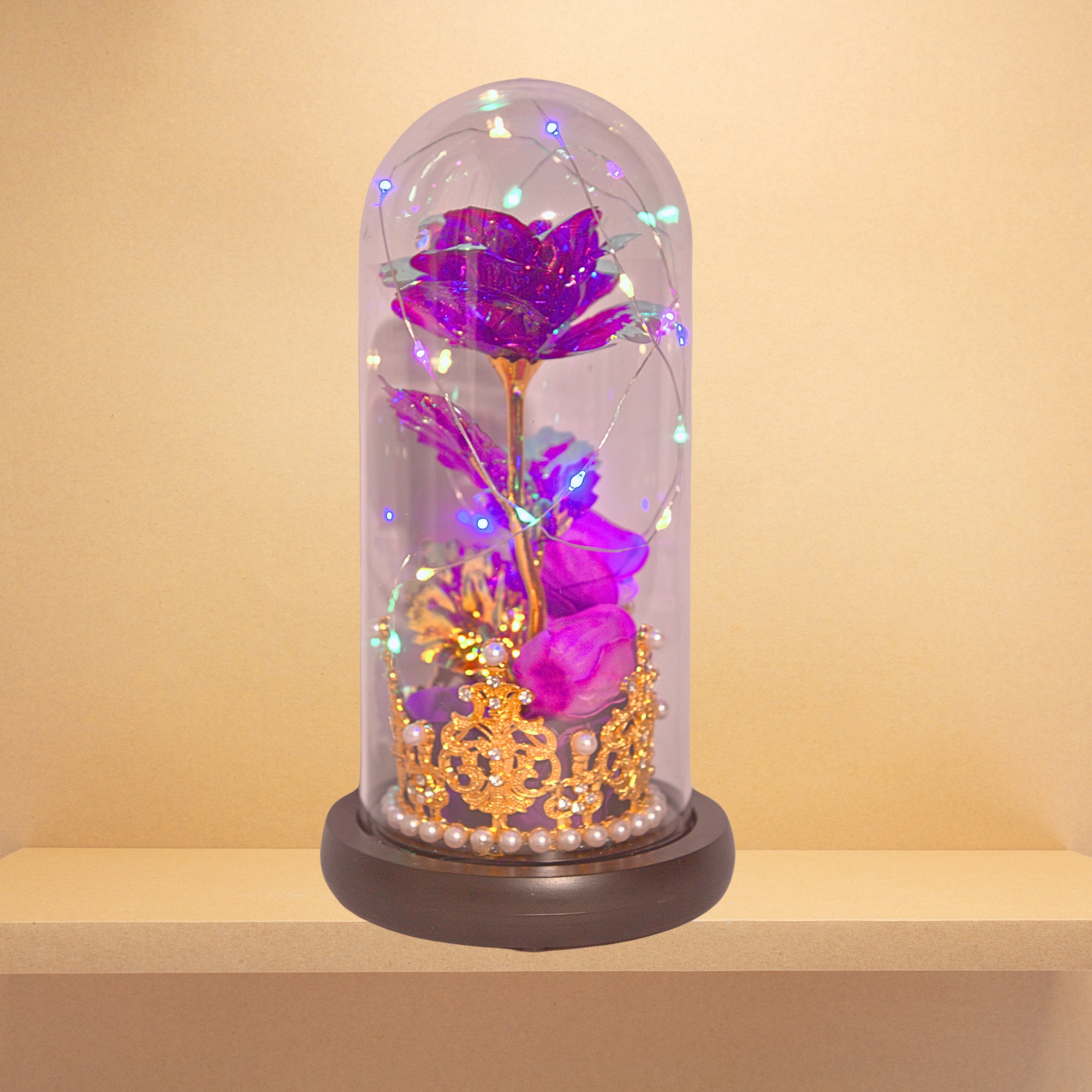 Majestic Bloom: Eternal Rose in a Crowned Glass Dome