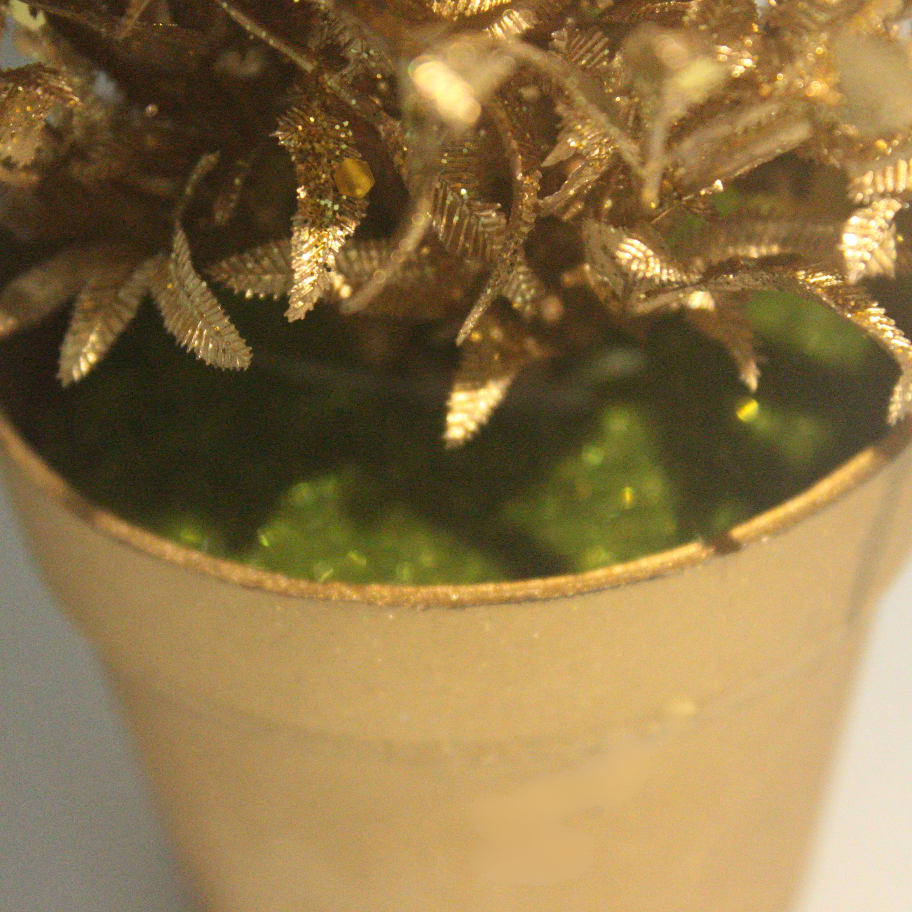 Gilded Grace: Elegant Gold-Toned Decorative Plant