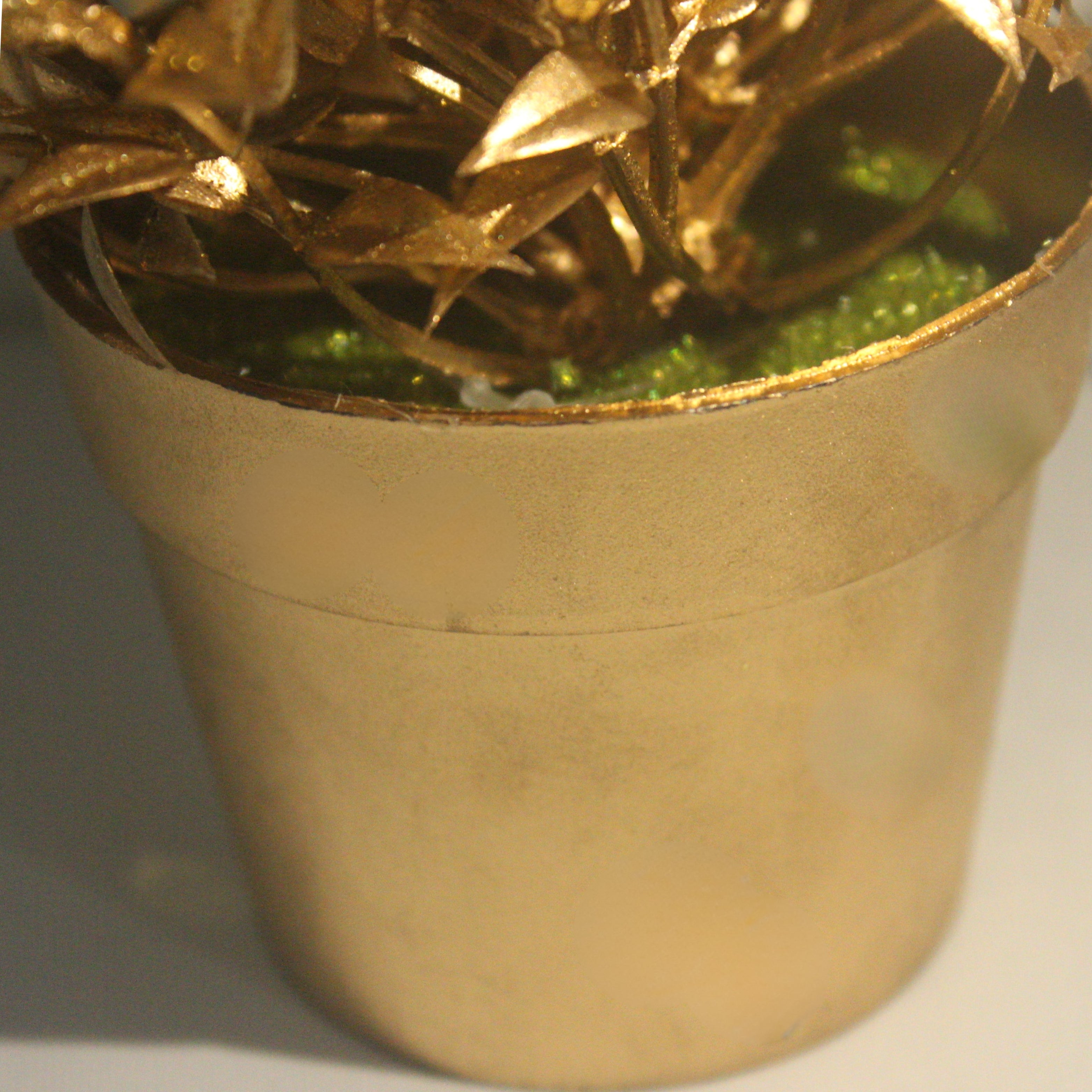 Golden Elegance: A Luxurious Potted Plant